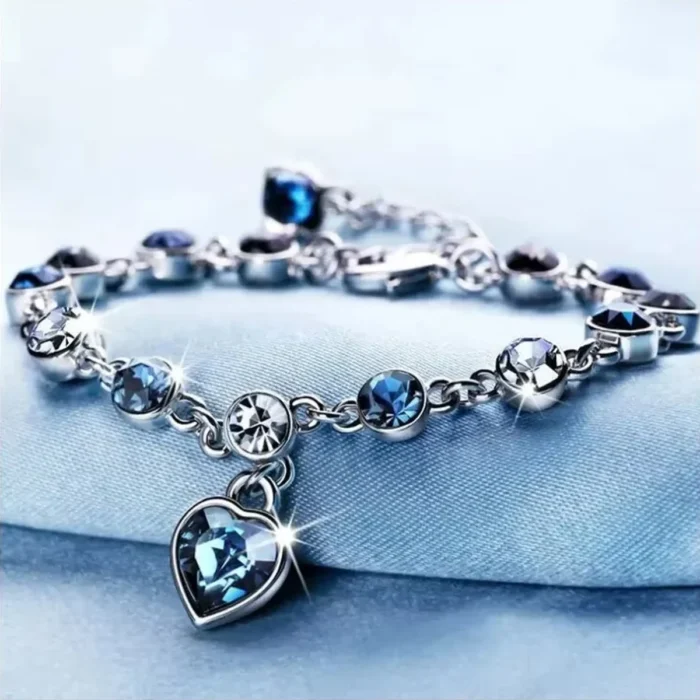 kf-S22a61ecf3d07457190ecf50d8c202a9aG.webp Women Silver Color Lucky Bracelet Female Blue Crystal Heart Charm Pulseras Bracelet Bridal Wedding Engagement Fine Jewelry Gift – Bild 1
